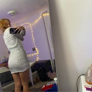 Fashionova sparkly long sleeve dress with slit down the chest